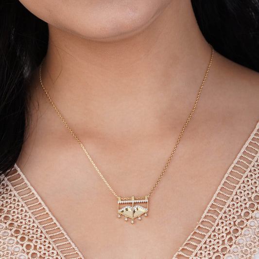 18k Yellow Gold necklace decorated with natural diamond stones from Burqa collection