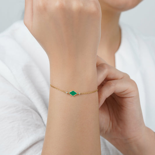 18k yellow gold bracelet decorated with gorgeous green enamel color and natural diamonds