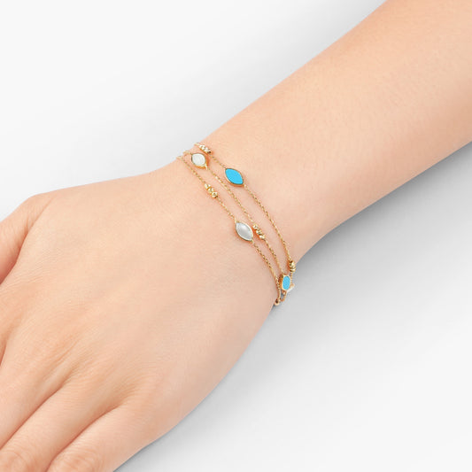 18k yellow gold bracelet three-layer decorated with mother of pearl and turquoise stones