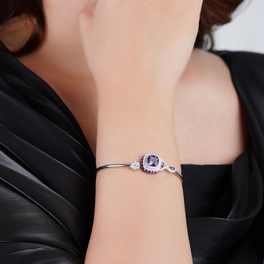 18k white gold bangle featuring a stunning natural diamond and amethyst