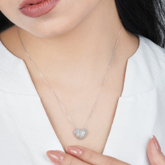 18K WHITE GOLD NECKLACE WITH HEART SHAPE DECORATED WITH NATURAL DIAMOND BAGUETTE