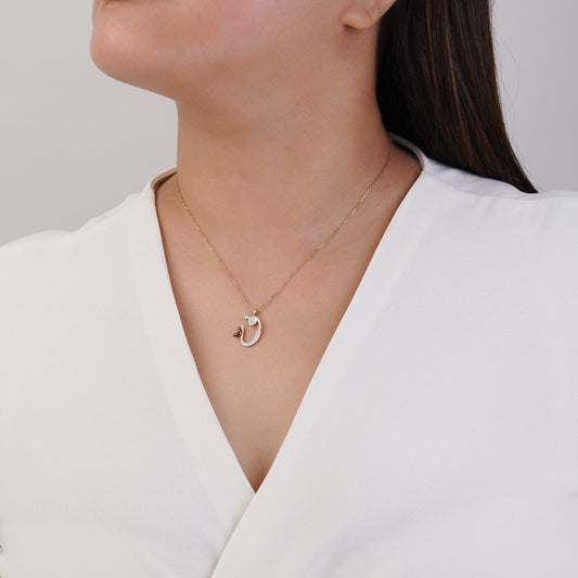 18k Yellow Gold 'FAA' Arabic Letter Necklace decorated with natural diamond and garnet stones