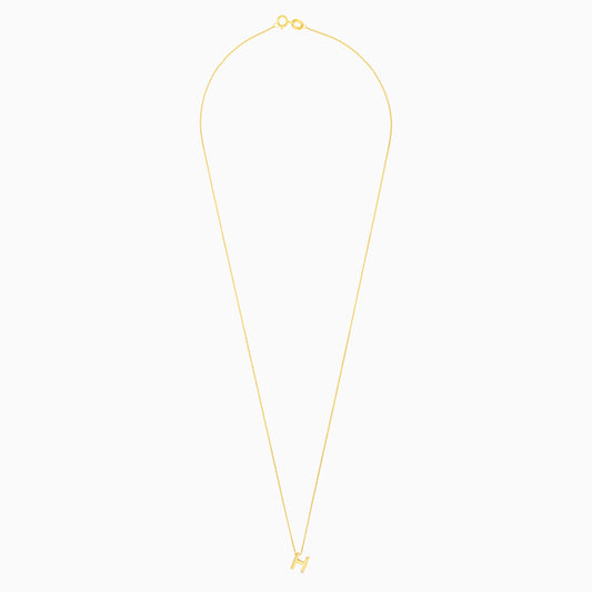 18k yellow gold necklace with letter “H” decorated with single natural diamond stone from Alpha collection