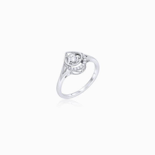 18K WHITE GOLD RING WITH A DROP SHAPE DECORATED WITH NATURAL DANCING DIAMOND