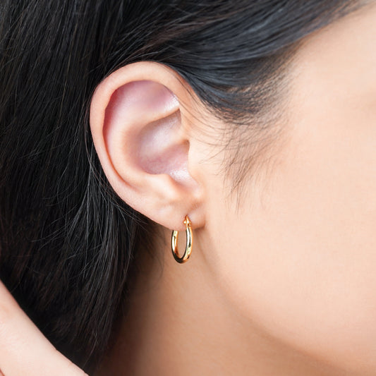18k yellow gold earrings in round shape - Hoops collection