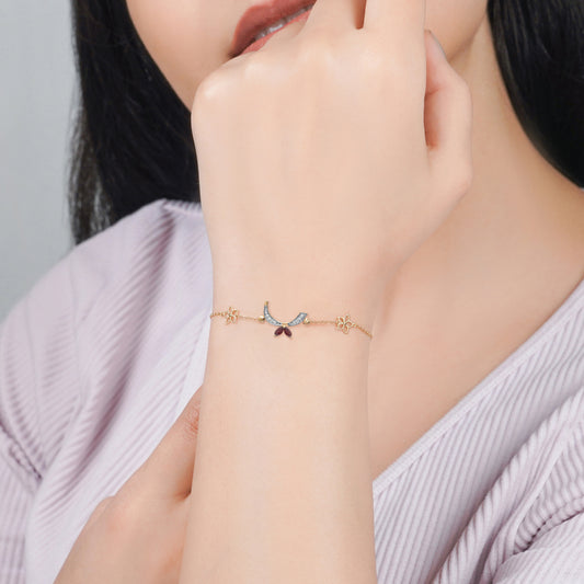 18k yellow gold bracelet with letter " Raa " in Arabic decorated with natural diamond and red garnet from Horofee collection