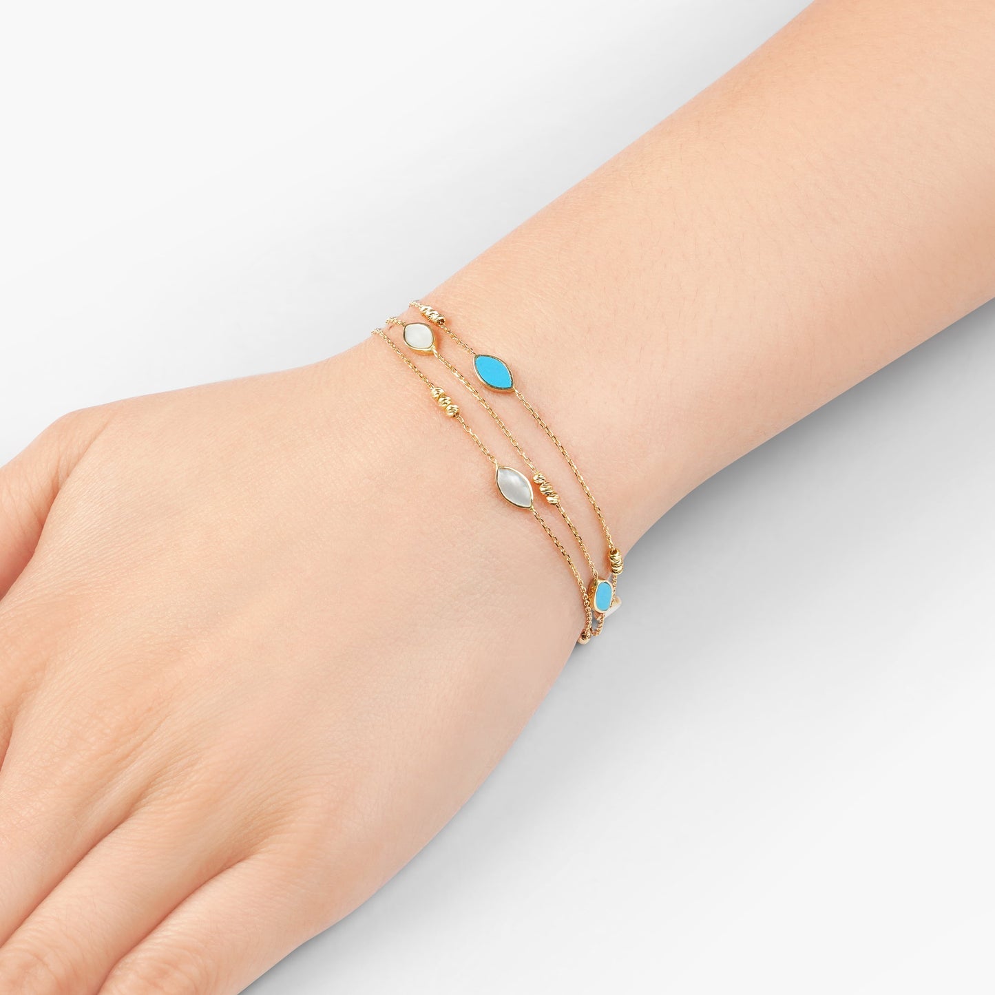 18k yellow gold bracelet three-layer decorated with mother of pearl and turquoise stones