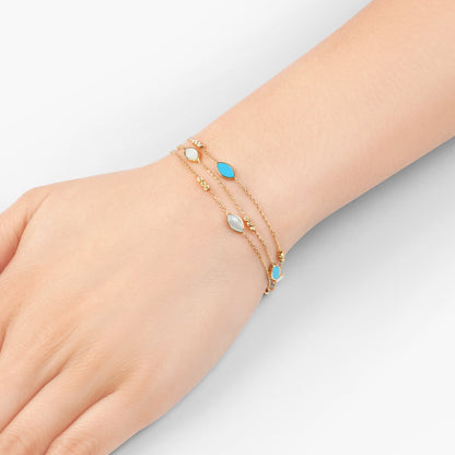 18k yellow gold bracelet three-layer decorated with mother of pearl and turquoise stones