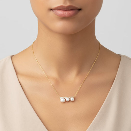 18k yellow necklace decorated with natural diamond and multiple sizes of pearls | Danah collection
