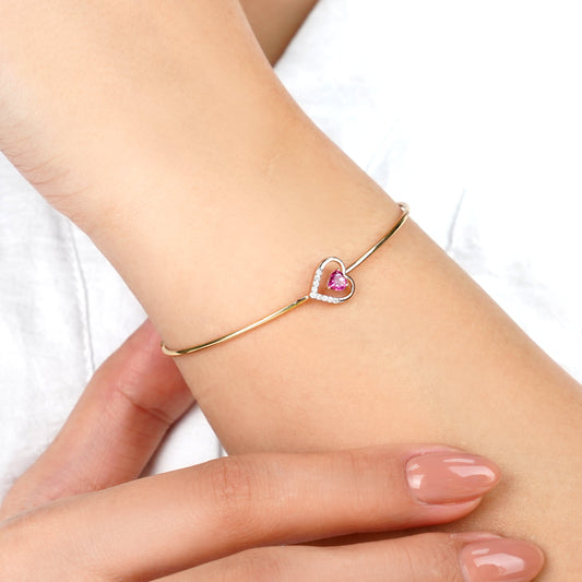18K Rose Gold Bangle Featuring Two Pink Topaz Hearts and Natural Diamonds