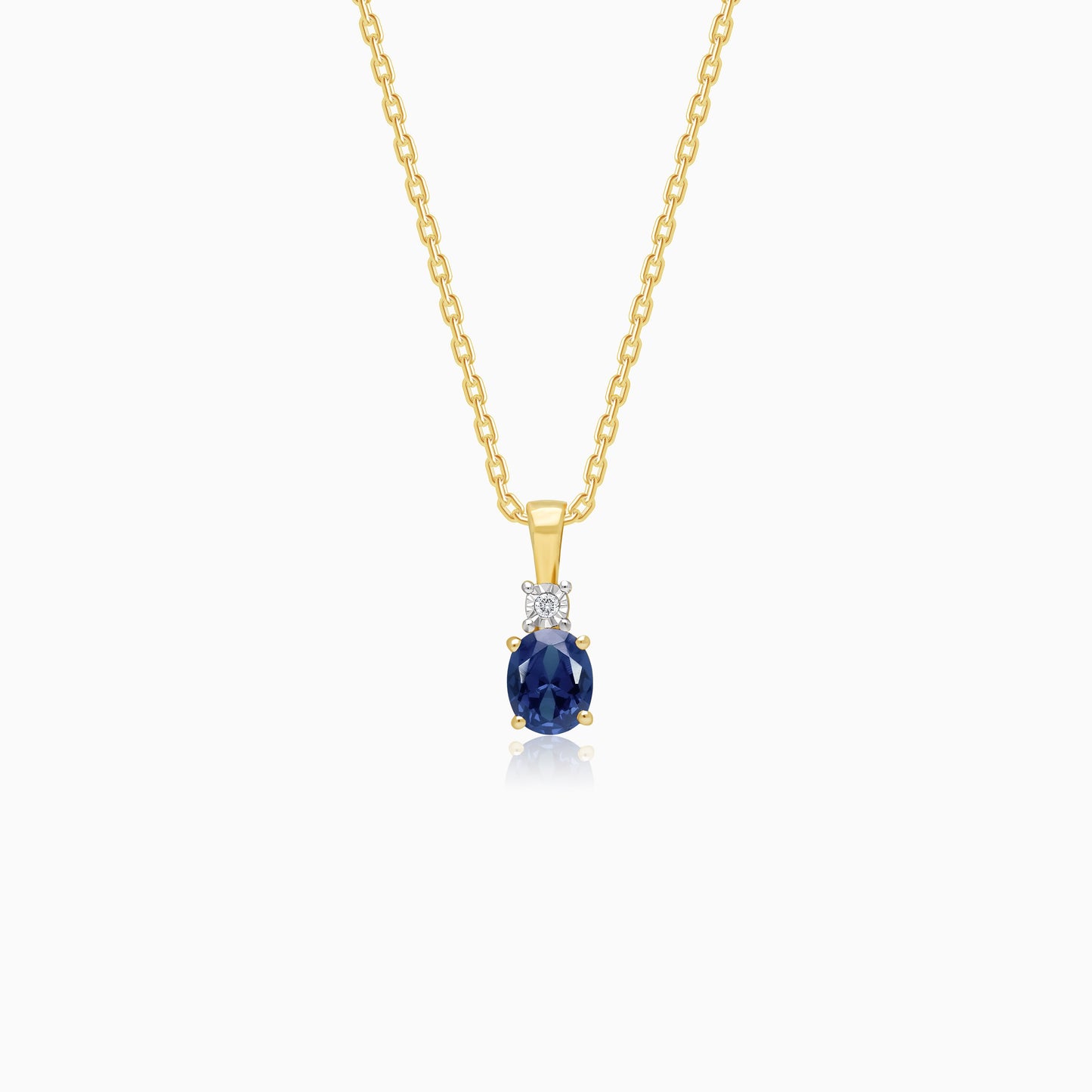 18k Yellow gold chain adorned with natural diamonds and a sapphire pendant | colour classic collection
