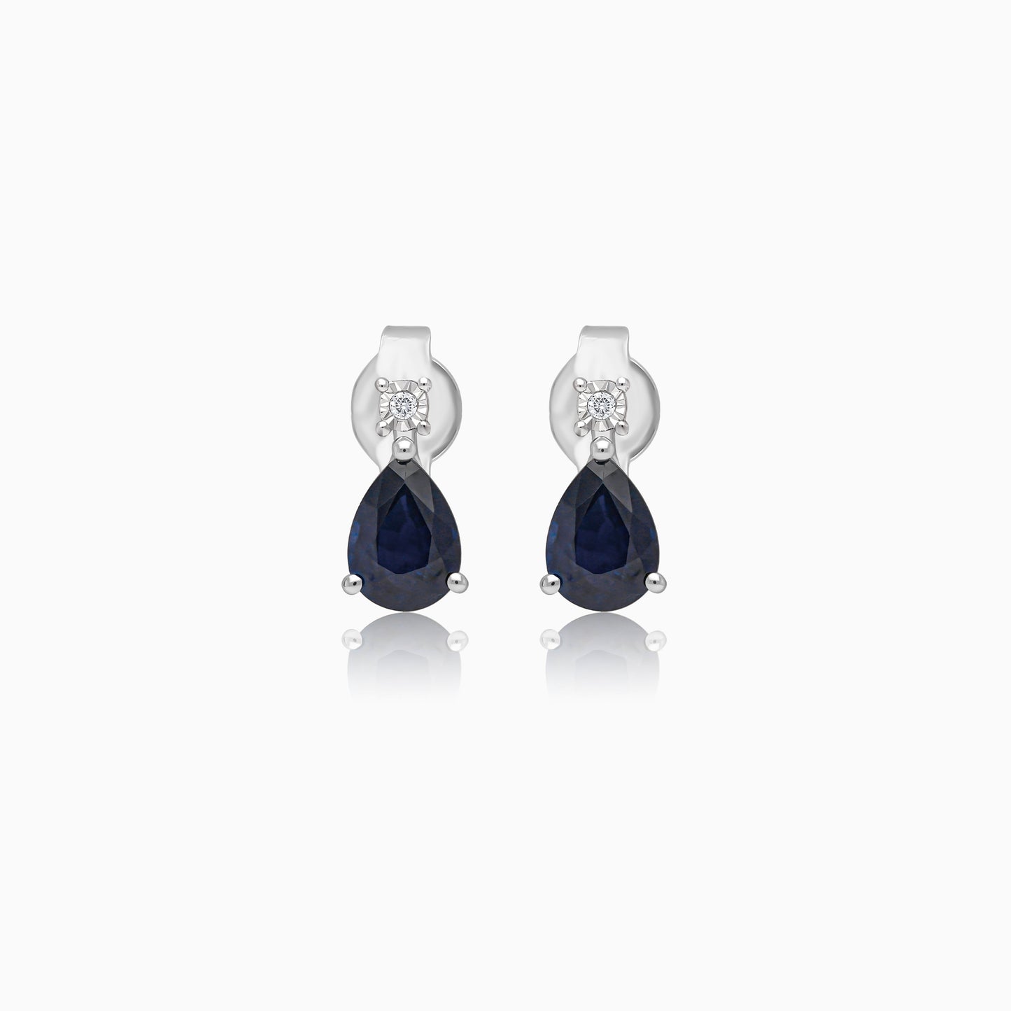 Drop shape sapphire and round brilliant cut natural diamond earrings in 18k white gold | colour classic collection