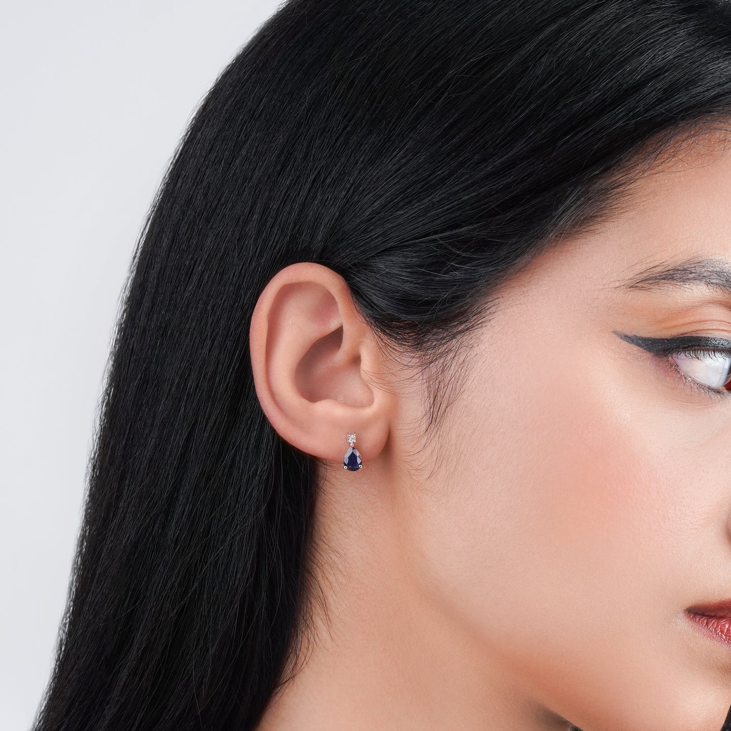 Drop shape sapphire and round brilliant cut natural diamond earrings in 18k white gold | colour classic collection