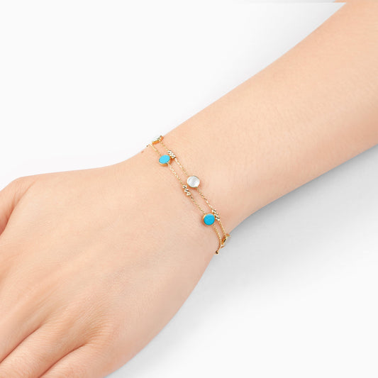 18k yellow gold bracelet two-layer decorated with mother of pearl and turquoise stones