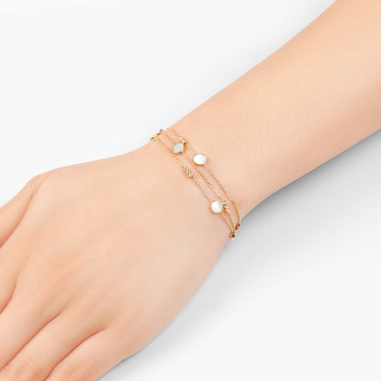 18k yellow gold bracelet  three-layer decorated with mother of pearl