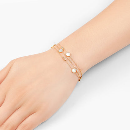 18k yellow gold bracelet  three-layer decorated with mother of pearl