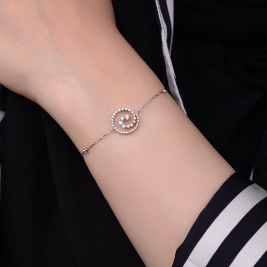 18k white gold Swirl Cuff Bracelet decorated with natural diamond stones | Dunyati collection