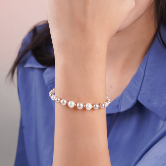 18k yellow gold bangle decorated with white and lavender pearls - from Danah Collection