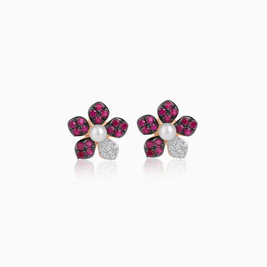 18k rose gold pair of earrings with a flower shape decorated with natural diamonds, ruby stones and pearls