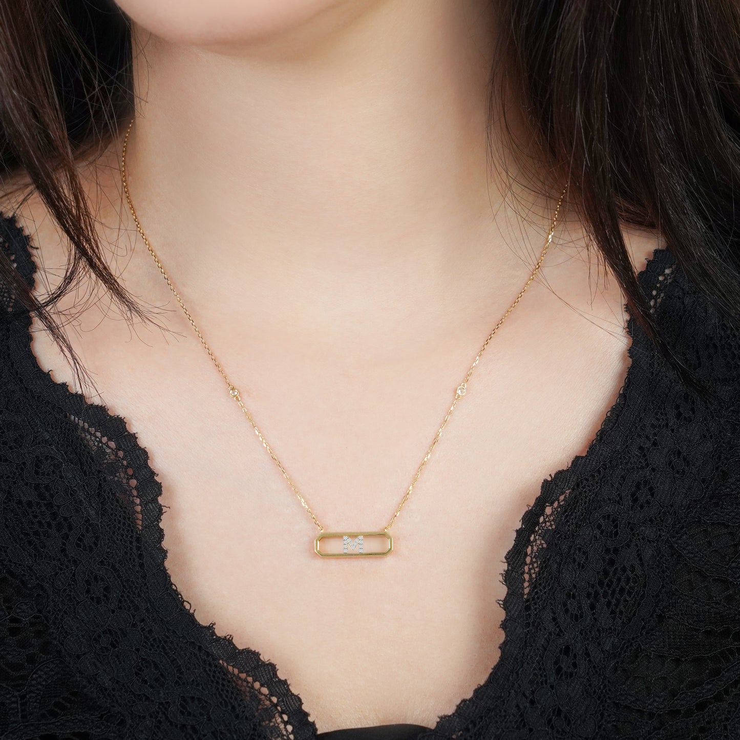 18K YELLOW GOLD NECKLACE LETTER "M" DECORATED WITH NATURAL DIAMOND