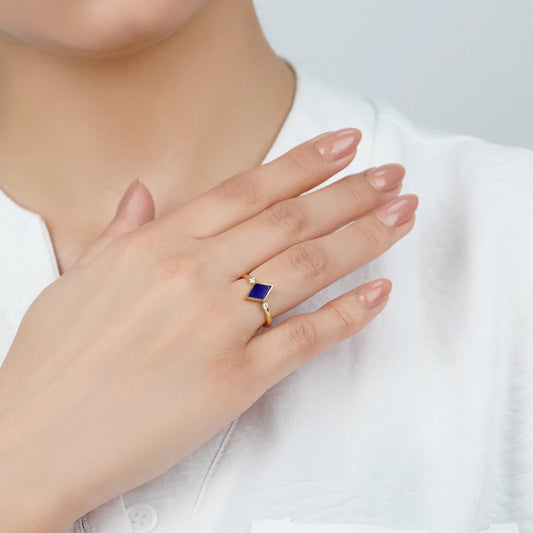 18k yellow gold ring decorated with dark blue enamel color and natural diamonds