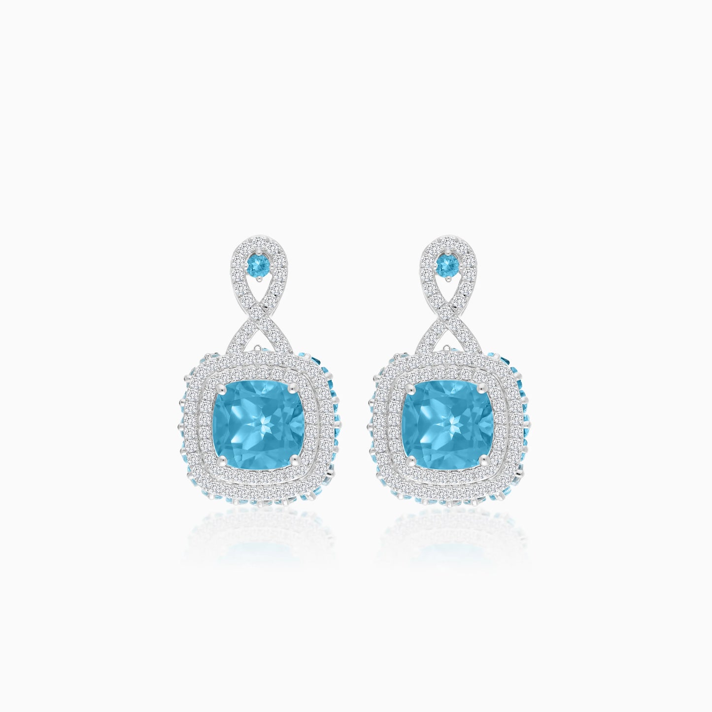 18K White Gold Earring featuring a stunning Natural Diamond and Blue Topaz stones