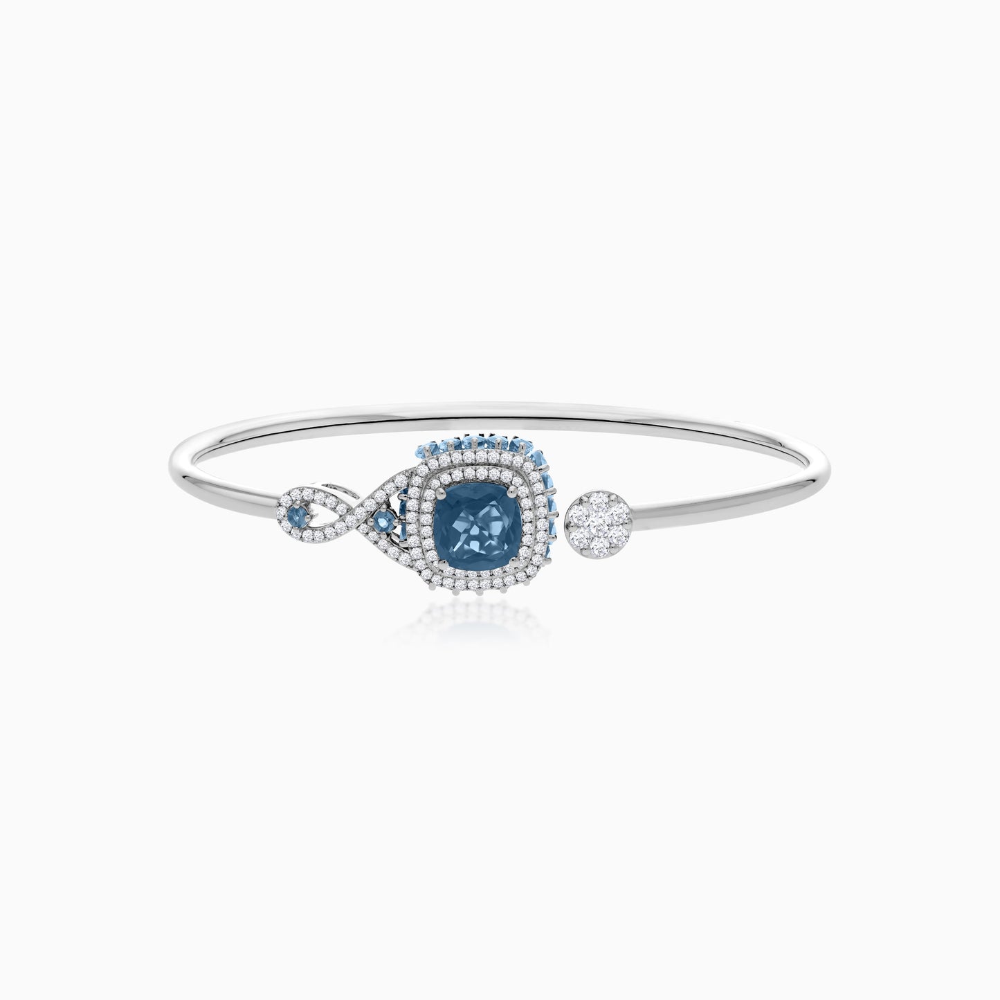 18K White Gold bangle featuring a stunning Natural Diamond and London blue Topaz stones