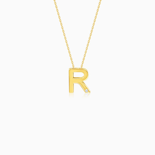 18k yellow gold necklace with letter “R” decorated with single  natural diamond stone from Alpha collection