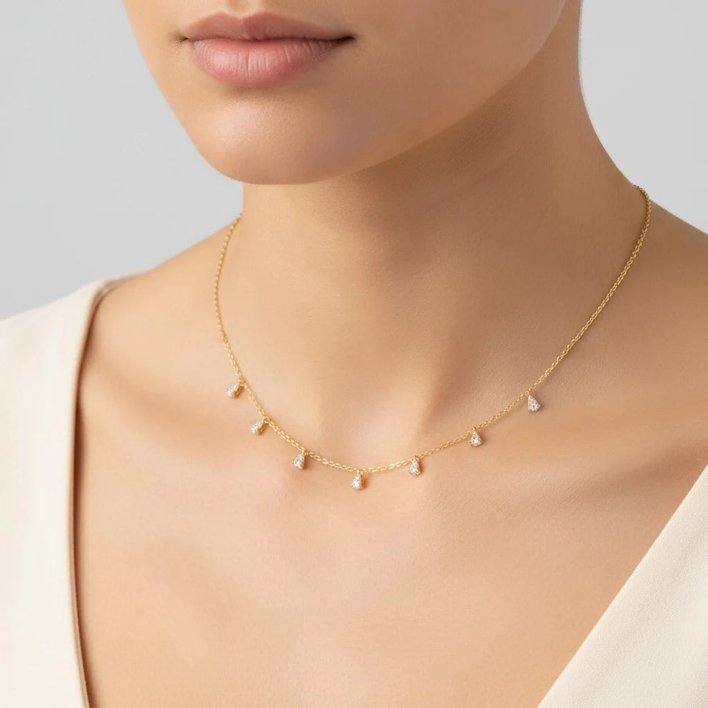 18k yellow gold necklace with dangling natural diamond stones | Trendy collection