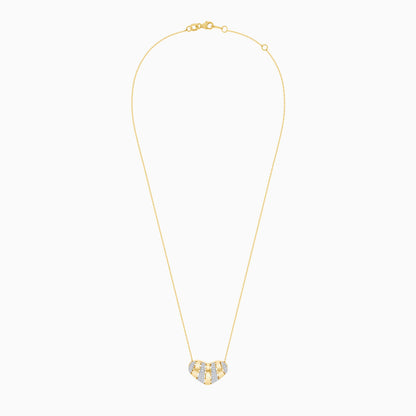 18k Yellow gold necklace with heart-shaped pendant decorated with natural diamond stones | valentine collection