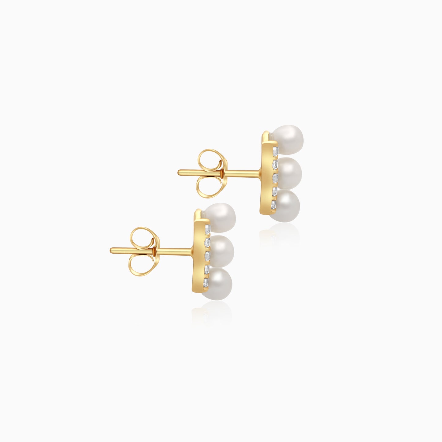 18k yellow gold earrings features 3 pearls aligning with zircon stones