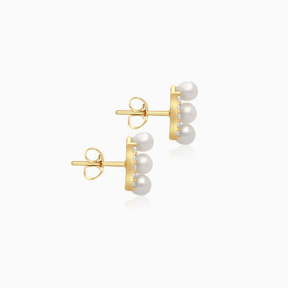 18k yellow gold earrings features 3 pearls aligning with zircon stones