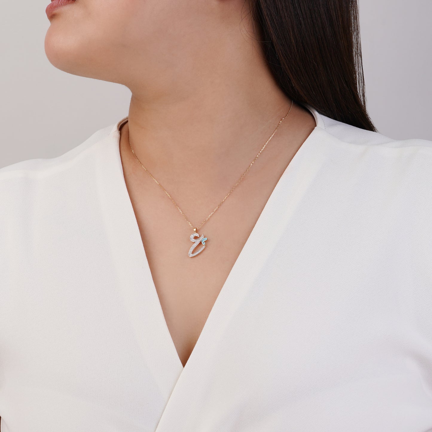 18K Yellow Gold ‘Ain’ Arabic Letter Necklace with Natural Diamonds & Blue Topaz | Horoufi Diamond Collection