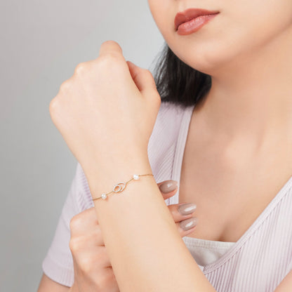 18K Yellow Gold Diamond Eye and Twin Pearl Bracelet – Danah Diamond Collection