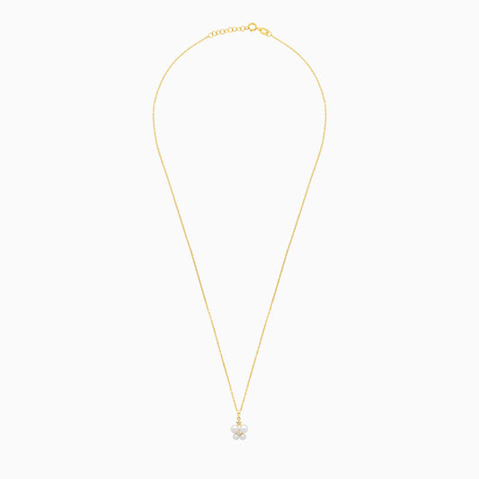 18k yellow gold necklace decorated by a single zircon stone in the centre surrounded by different sizes of pearls