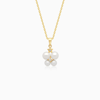 18k yellow gold necklace decorated by a single zircon stone in the centre surrounded by different sizes of pearls