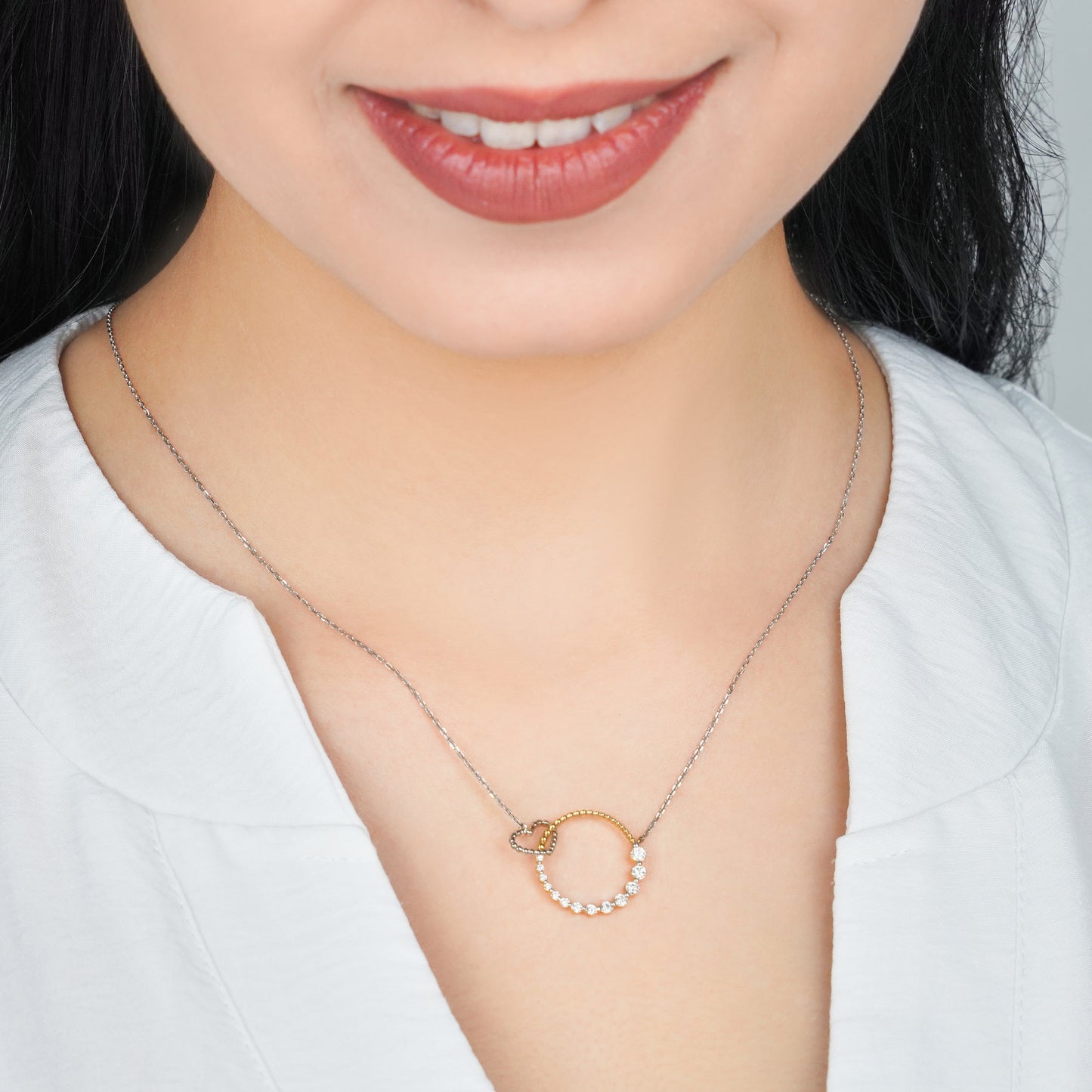 18K Yellow and White Gold Intertwined Circle Necklace with Diamond Heart – Dunyati Collection