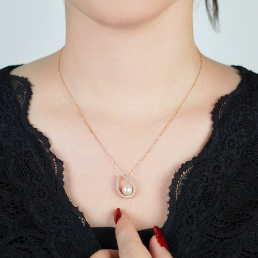 18K Yellow Gold Necklace adorned with Pearls and Sparkling Zircon Stones from the Danah Collection