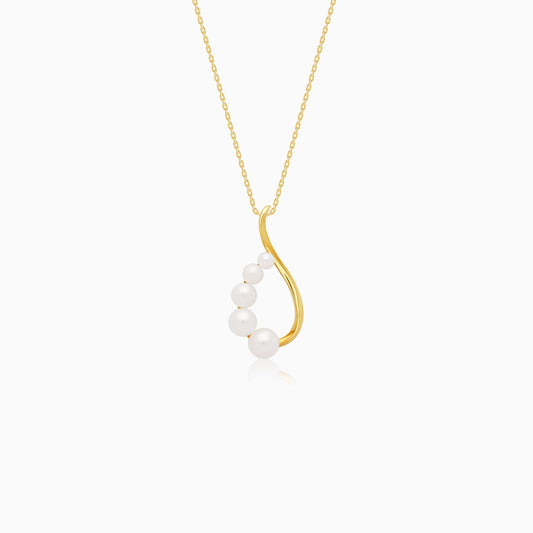 An elegant 18-karat yellow gold necklace adorned with flowing lines of assorted size white pearls
