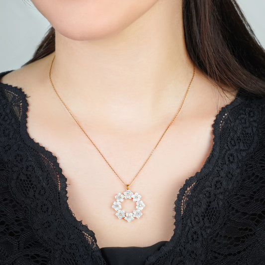 18K YELLOW GOLD NECKLACE WITH (MOP) FLOWER SHAPES AND ZIRCON STONES