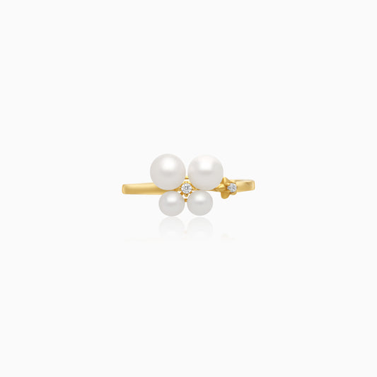 18k yellow gold ring decorated by zircon stone and pearls