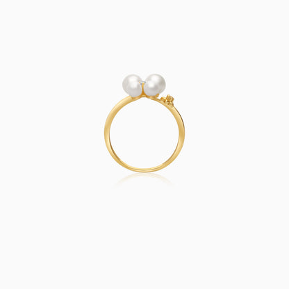 18k yellow gold ring decorated by zircon stone and pearls