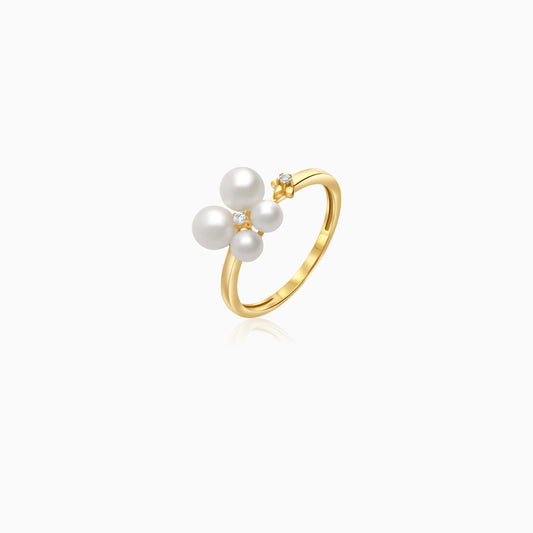 18k yellow gold ring decorated by zircon stone and pearls