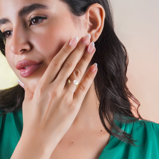 18k yellow gold open ring decorated with single pearl and zircon stones | Danah Collection