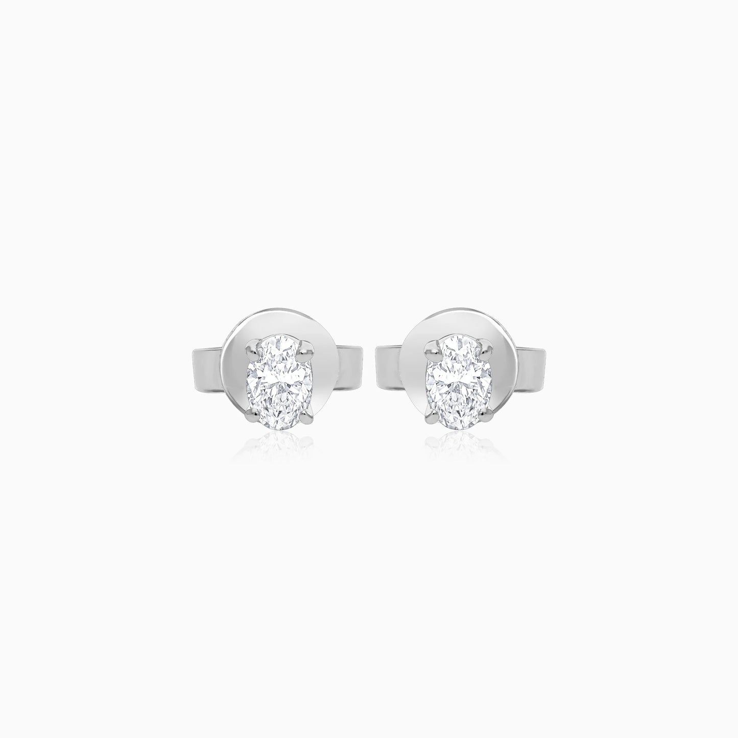 18k white gold pair of earrings  from solitaire collection decorated with an oval cut natural diamond