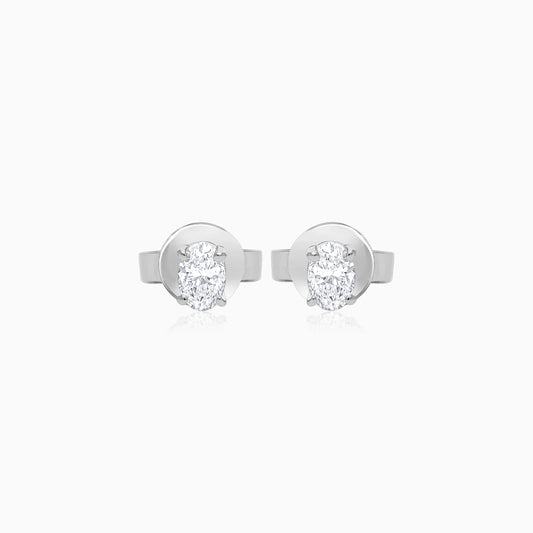 18k white gold pair of earrings  from solitaire collection decorated with an oval cut natural diamond