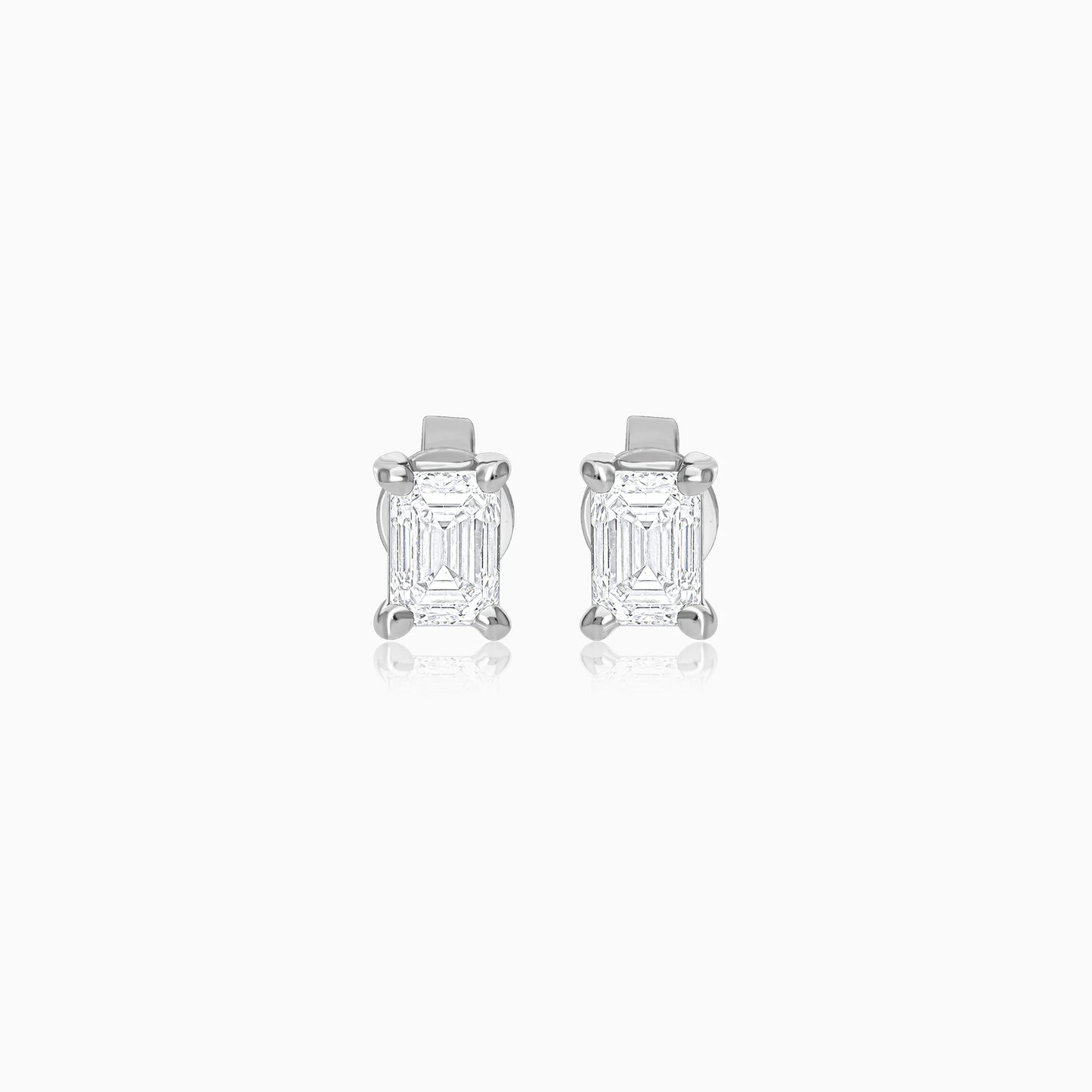 18k white gold pair of earrings from solitaire collection decorated with an emerald cut shape natural diamond