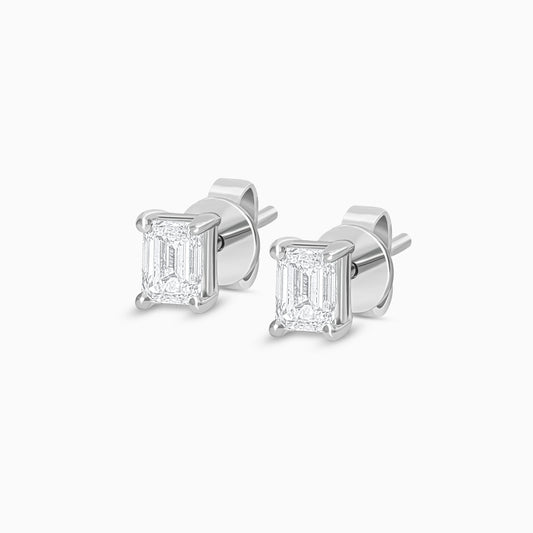 18k white gold pair of earrings from solitaire collection decorated with an emerald cut shape natural diamond