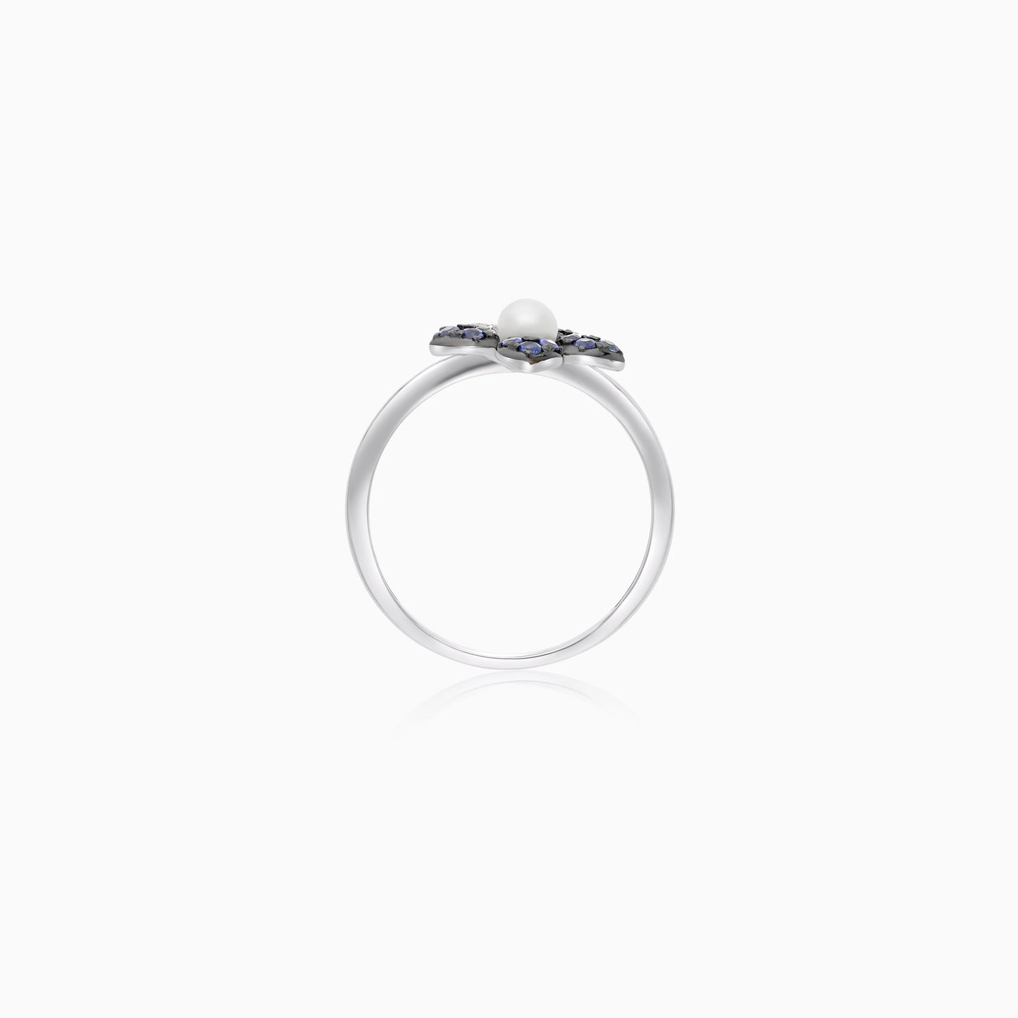 18k white gold ring with a flower shape on the top decorated with natural diamond, Sapphire stones and single pearl in the center