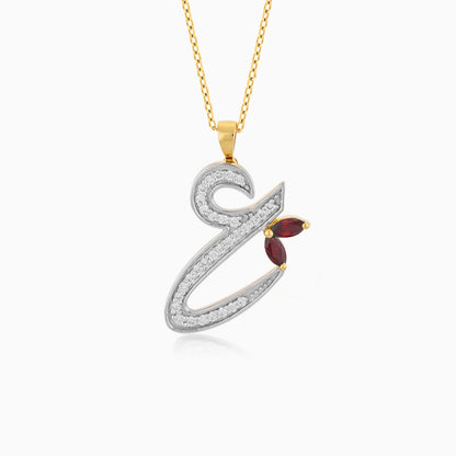 18k yellow gold ‘Ain’ arabic letter necklace decorated With Natural Diamond and garnet stones